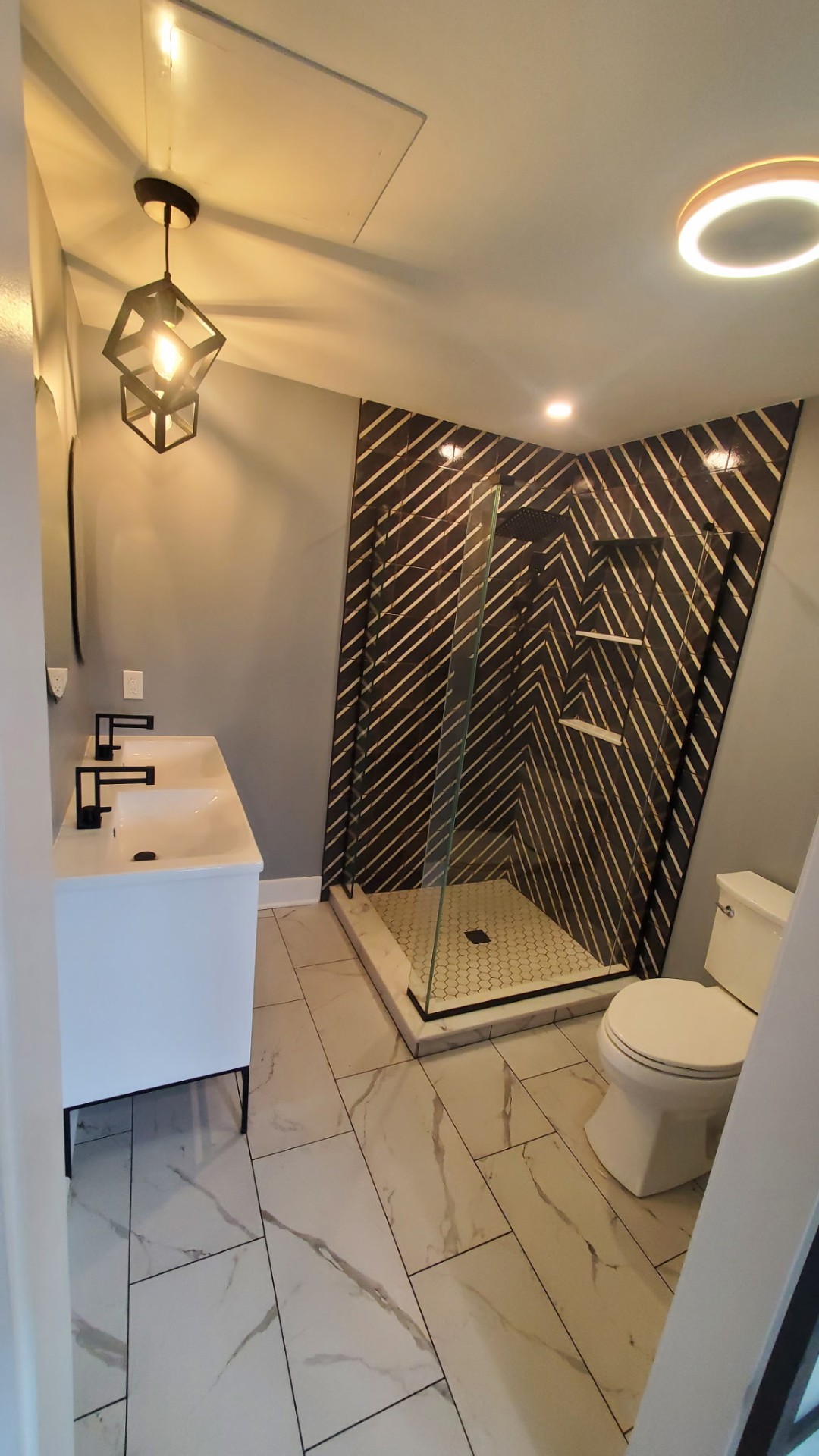Chevron Tile Walk-In Shower — Bathroom remodel in Squirrel Hill, PA by Trademark Design